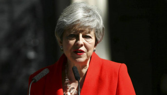 Theresa May says she'll quit as Conservative leader June 7