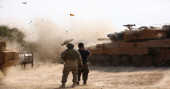 Turkey says Kurdish fighters still remain near Syrian border