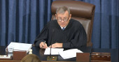 Roberts admonishes House prosecution, White House defense