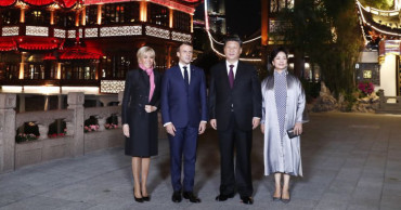 Xi and his wife meet French president and his wife