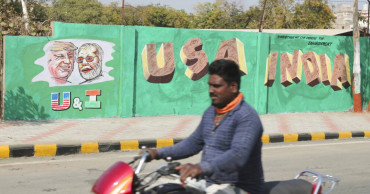 India builds wall along slum ahead of Trump visit