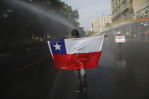 Chilean president shaking up government amid protests