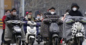 Virus-hit Chinese city bans most cars from downtown