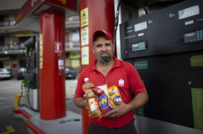 Venezuelans buy gas with cigarettes to battle inflation