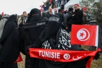 Tunisia bans face veils in public buildings for security