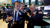 US stocks claw back lost ground as China stabilizes currency