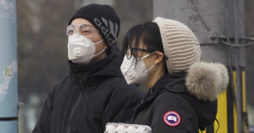 China picks new leaders to lead fight in virus epicenter