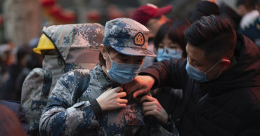 Virus death toll in China rises to 56 with about 2,000 cases