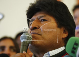 Morales leads in Bolivia vote, but seems headed for runoff
