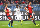 Reina saves penalty as Milan wins 2-1 at Genoa