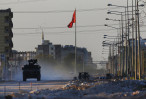 Turkey says troops captured Syrian border town
