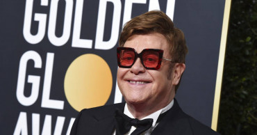 Elton John, sick with pneumonia, cuts New Zealand show short