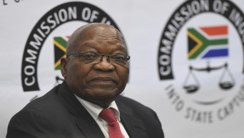 South Africa's ex-president denies corruption at inquest