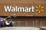 Swallowing $16B purchase of Flipkart, Walmart cuts outlook