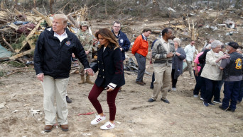 Trump surveys devastation, pays respects to tornado victims