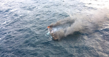 11 missing from South Korean fishing boat burned by fire