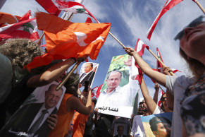 Competing protests in Lebanon bring thousands to the streets